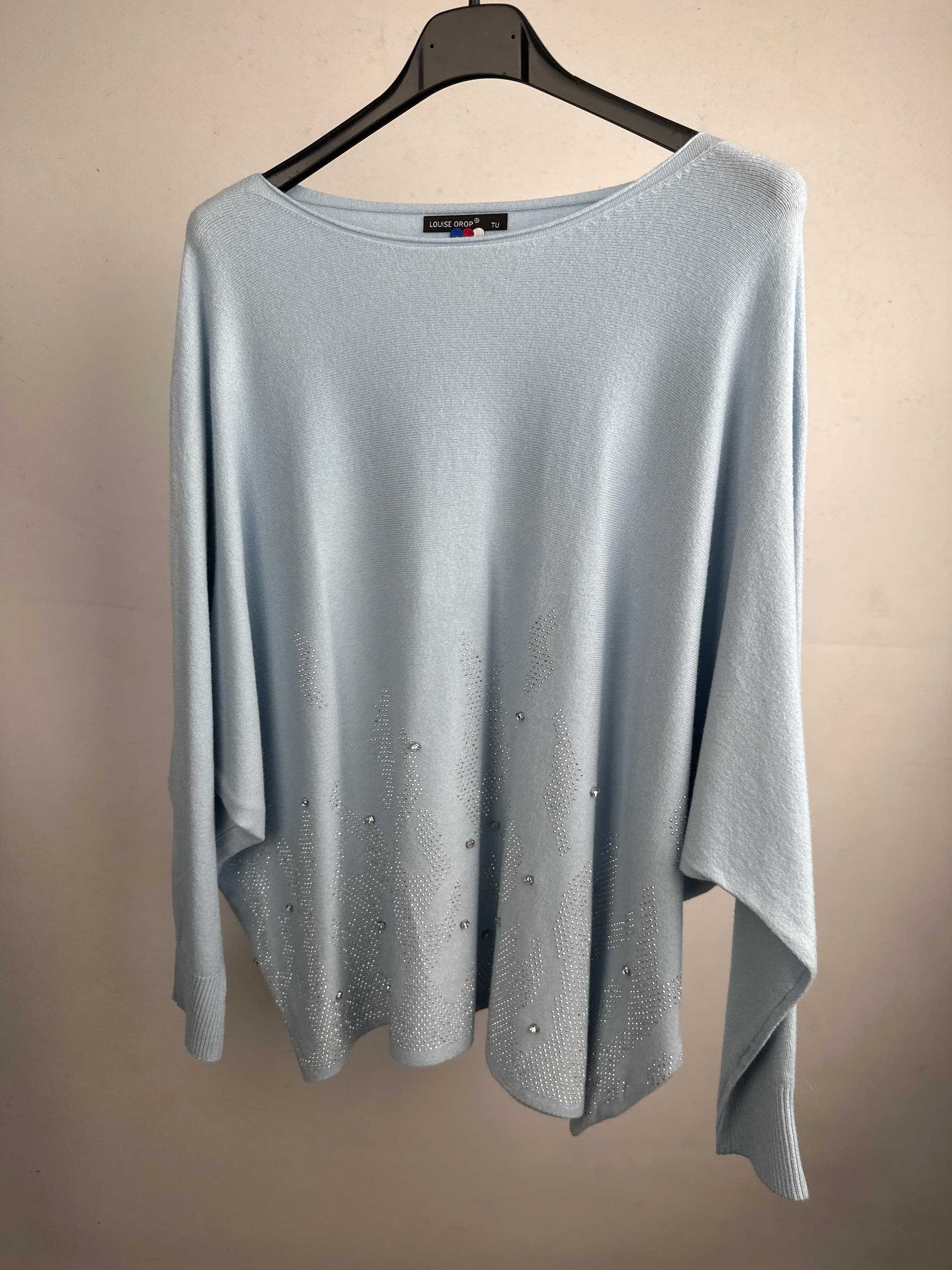 Sweter z cyrkoniami na dole