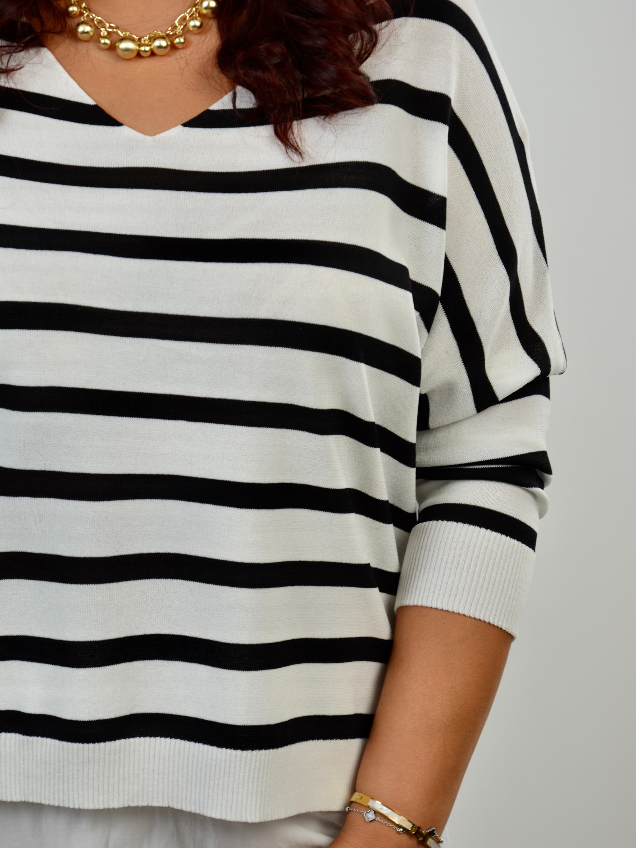 Sweter letni w paski